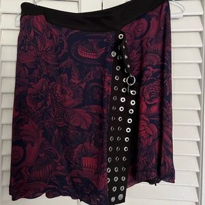 DIESEL SKIRT WITH A DRESS AND DECORATIVE ELEMENTS